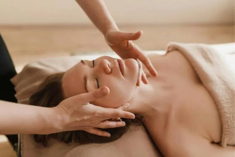 Woman receiving a full-body relaxation massage for stress relief